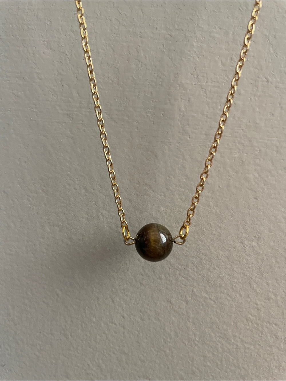 Cats eye round shaped gemstone necklace